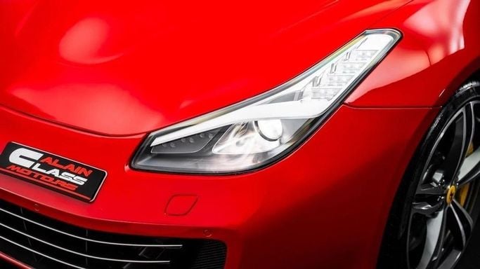 Подержанный Ferrari GTC4Lusso, 6.3 л, 2017 в Дубае от Al Ain Class Motors Красный цвет. GCC | AUTO.AE