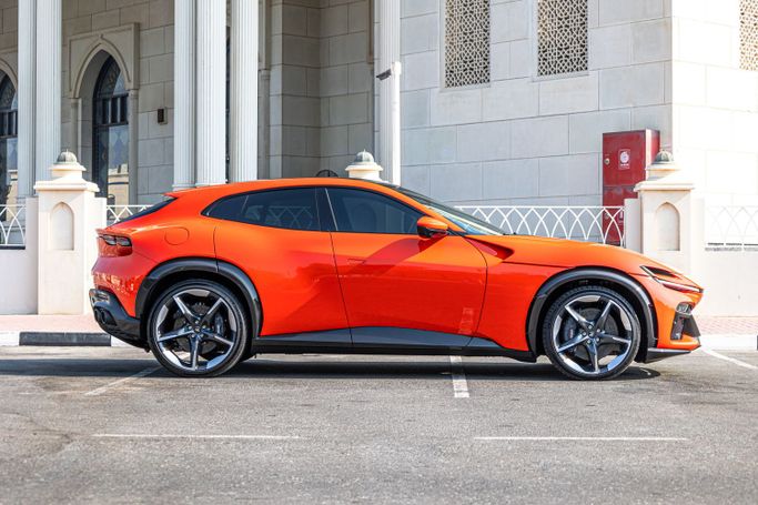 Ferrari Purosangue, 2024 внедорожник 5 дв. спорт класса в Дубае от POF RENTAL оранжевый цвет | AUTO.AE