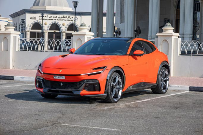 Ferrari Purosangue, 2024 внедорожник 5 дв. спорт класса в Дубае от POF RENTAL оранжевый цвет | AUTO.AE