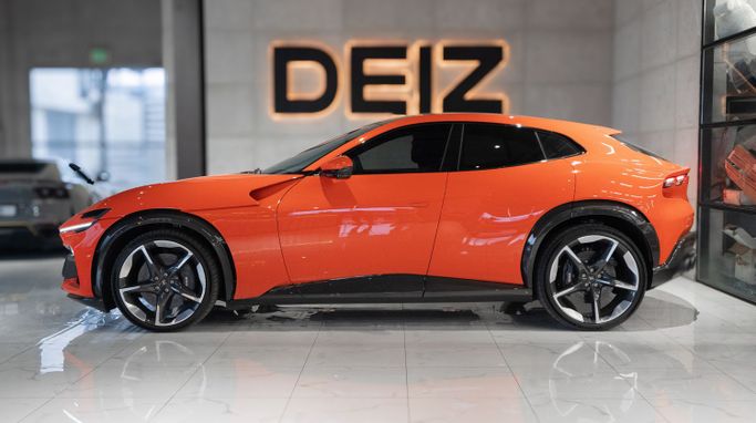 Ferrari Purosangue, 2024 внедорожник 5 дв. спорт класса в Дубае от DEIZ оранжевый цвет | AUTO.AE