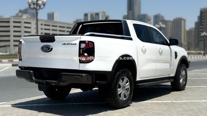 Подержанный Ford Ranger T6.2, 2.0 л, 2024 в Дубае от Alhamd Motors Белый цвет. Other | AUTO.AE