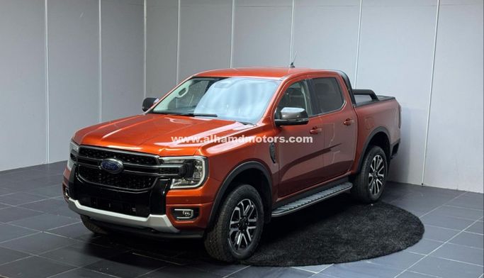 Used Ford Ranger T6.2, 3.0 l, 2023 in Dubai by Alhamd Motors, Orange color. Other | AUTO.AE