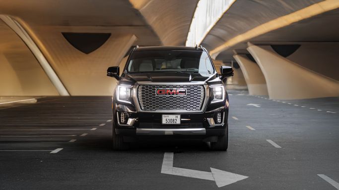 GMC Yukon V, 2023 standard suv 5 dr. for rent in Dubai by AVA car rental, black color | AUTO.AE