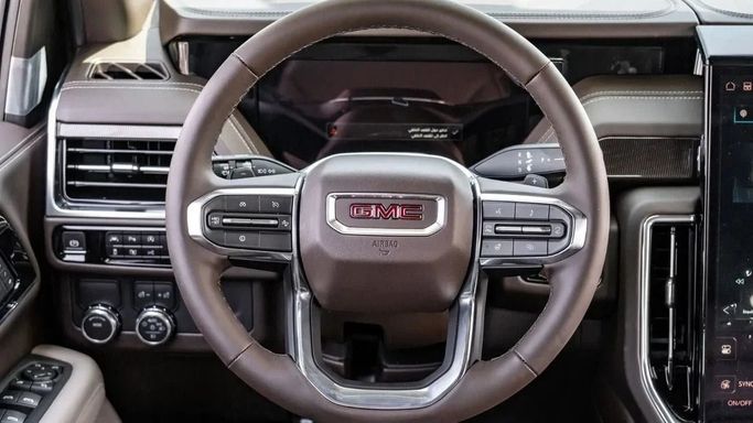 New GMC Yukon V Facelift, 5.3 l, 2025 in Dubai by Altass Motors, Black color. GCC Specs | AUTO.AE