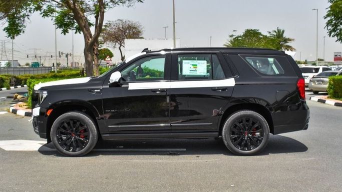 New GMC Yukon V, 6.2 l, 2024 in Dubai by Najem Motors, Black color. GCC Specs | AUTO.AE