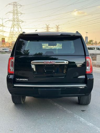 Подержанный GMC Yukon IV (GMT K2UG), 6.2 л, 2015 в Дубае от Alzahiah Cars Черный цвет. GCC | AUTO.AE