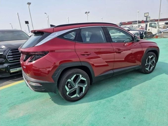Новый Hyundai Tucson IV Рестайлинг, 1.6 л, 2023 в Дубае от Mohamed Hakim Motors Красный цвет. GCC | AUTO.AE