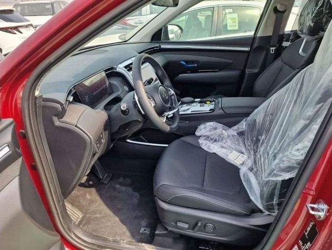 Новый Hyundai Tucson IV Рестайлинг, 1.6 л, 2023 в Дубае от Mohamed Hakim Motors Красный цвет. GCC | AUTO.AE