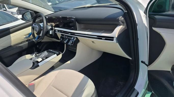 Новый Hyundai Tucson IV Рестайлинг, 1.5 л, 2025 в Дубае от Mohamed Hakim Motors Белый цвет. GCC | AUTO.AE