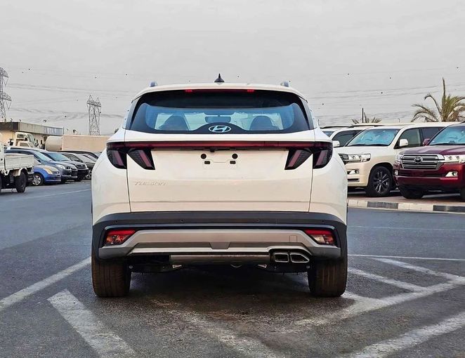 New Hyundai Tucson IV Facelift, 2.0 l, 2025 in Dubai by SK Motors, White color. GCC Specs | AUTO.AE