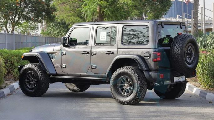 New Jeep Wrangler IV (JL) Facelift, 6.4 l, 2025 in Dubai by Auto Max Group, Grey color. GCC Specs | AUTO.AE
