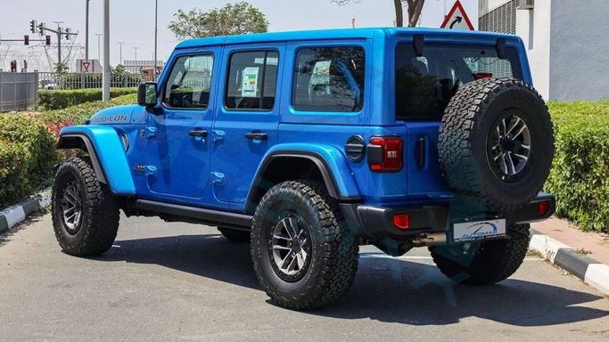 New Jeep Wrangler IV (JL) Facelift, 6.4 l, 2024 in Dubai by Auto Max Group, Light Blue color. GCC Specs | AUTO.AE