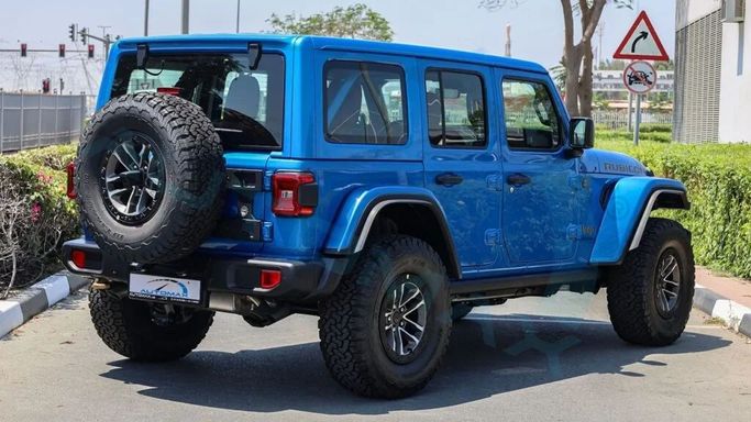New Jeep Wrangler IV (JL) Facelift, 6.4 l, 2024 in Dubai by Auto Max Group, Light Blue color. GCC Specs | AUTO.AE