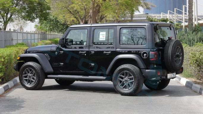 New Jeep Wrangler IV (JL) Facelift, 2.0 l, 2025 in Dubai by Auto Max Group, Black color. GCC Specs | AUTO.AE