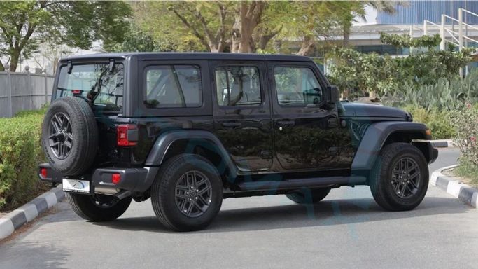 New Jeep Wrangler IV (JL) Facelift, 2.0 l, 2025 in Dubai by Auto Max Group, Black color. GCC Specs | AUTO.AE