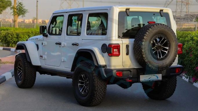 Новый Jeep Wrangler IV (JL) Рестайлинг, 2.0 л, 2025 в Дубае от Auto Max Group Белый цвет. GCC | AUTO.AE