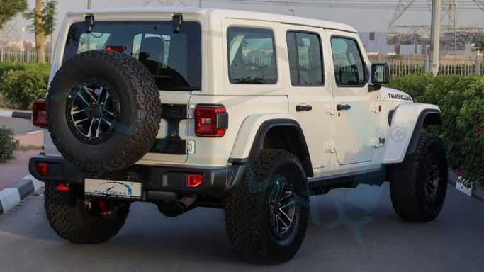 Новый Jeep Wrangler IV (JL) Рестайлинг, 2.0 л, 2025 в Дубае от Auto Max Group Белый цвет. GCC | AUTO.AE
