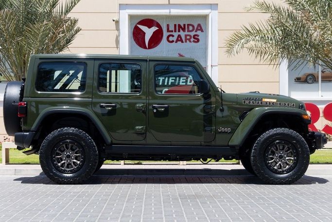 Used Jeep Wrangler IV (JL), 6.4 l, 2023 in Dubai by Linda Cars, Green color. GCC Specs | AUTO.AE