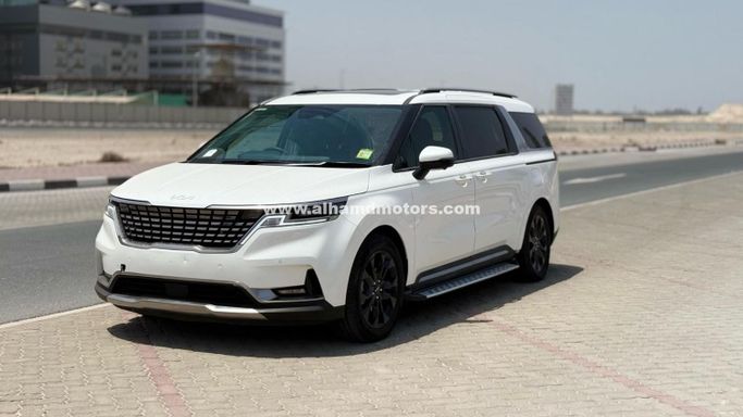 Подержанный Kia Carnival IV, 2.2 л, 2023 в Дубае от Alhamd Motors Белый цвет. Other | AUTO.AE