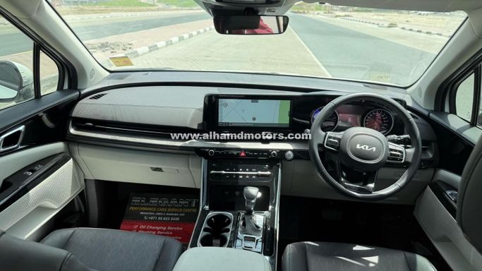 Подержанный Kia Carnival IV, 2.2 л, 2023 в Дубае от Alhamd Motors Белый цвет. Other | AUTO.AE