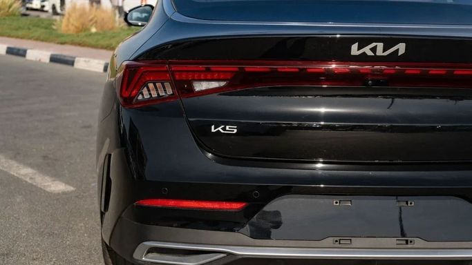 New Kia K5 III, 1.5 l, 2025 in Dubai by Altass Motors, Black color. Other | AUTO.AE