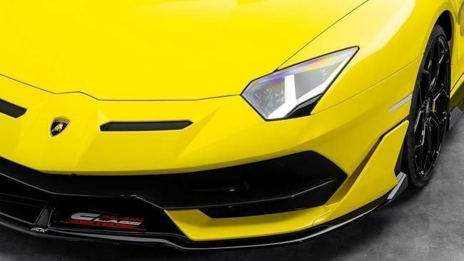 Used Lamborghini Aventador SVJ I Facelift, 6.5 l, 2019 in Dubai by Al Ain Class Motors, Yellow color. GCC Specs | AUTO.AE