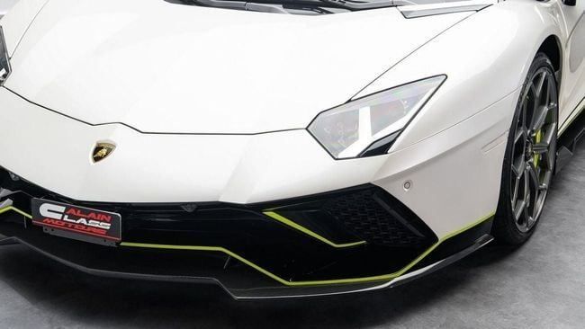 Used Lamborghini Aventador LP780-4 Ultimae I Facelift, 6.5 l, 2022 in Dubai by Al Ain Class Motors, White color. GCC Specs | AUTO.AE