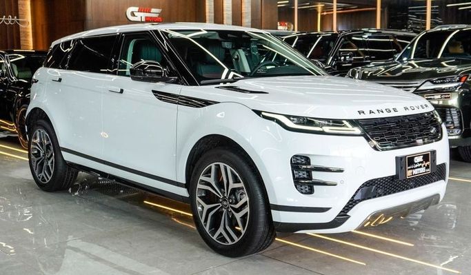 Новый Land Rover Range Rover Evoque P160 II Рестайлинг, 1.5 л, 2024 в Дубае от Najem Motors Белый цвет. Китайская | AUTO.AE