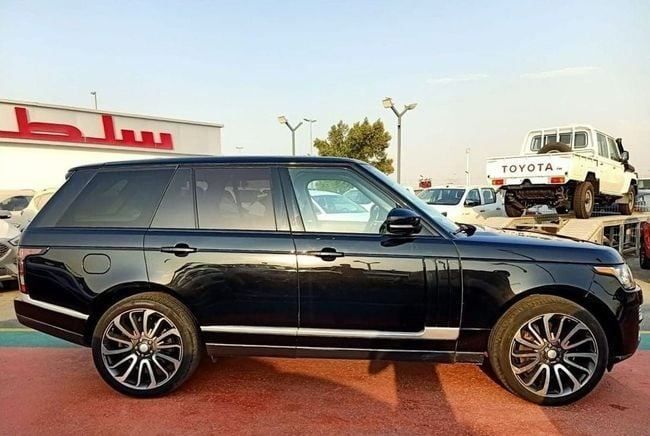 Used Land Rover Range Rover IV, 5.0 l, 2015 in Dubai by Soltan Auto, Black color. American Specs | AUTO.AE