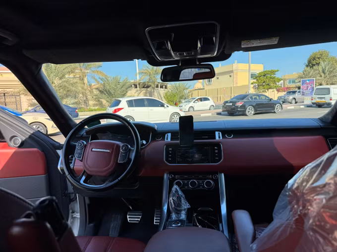 Подержанный Land Rover Range Rover Sport II, 5.0 л, 2014 в Дубае Белый цвет. GCC | AUTO.AE