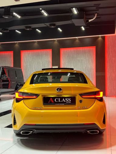Подержанный Lexus RC 350 I Рестайлинг, 3.5 л, 2023 в Дубае от A Class Motors Желтый цвет.  | AUTO.AE