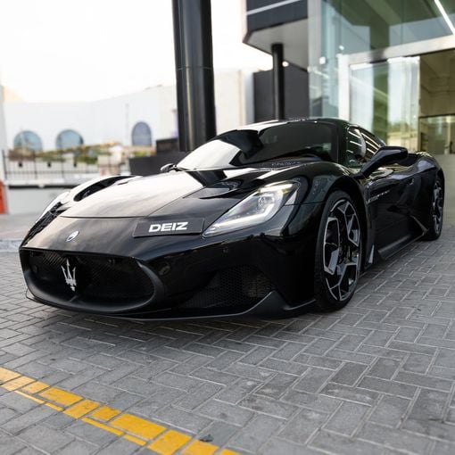 Maserati MC20, 2023 sport coupe for rent in Dubai by DEIZ, black color | AUTO.AE