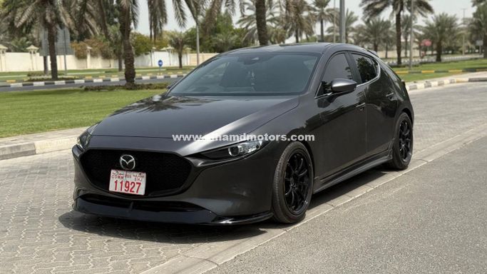 Подержанный Mazda 3 IV (BP), 2.0 л, 2023 в Дубае от Alhamd Motors Серый цвет. Other | AUTO.AE