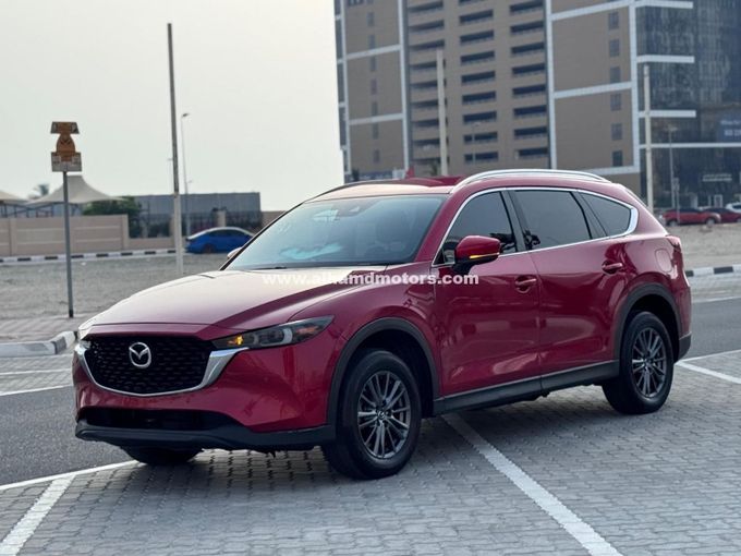 Подержанный Mazda CX-8, 2.5 л, 2021 в Дубае от Alhamd Motors Красный цвет. Other | AUTO.AE