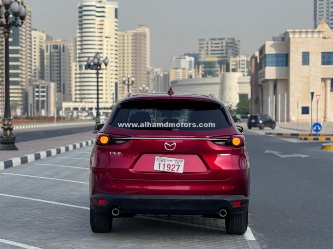 Подержанный Mazda CX-8, 2.5 л, 2021 в Дубае от Alhamd Motors Красный цвет. Other | AUTO.AE