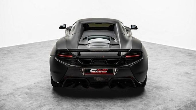 Подержанный McLaren 650S, 3.8 л, 2015 в Дубае от Al Ain Class Motors Черный цвет. GCC | AUTO.AE