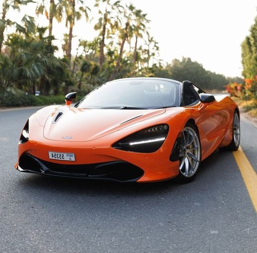 McLaren 720S, 2023 sport roadster spider for rent in Dubai by AVA car rental, orange color | AUTO.AE