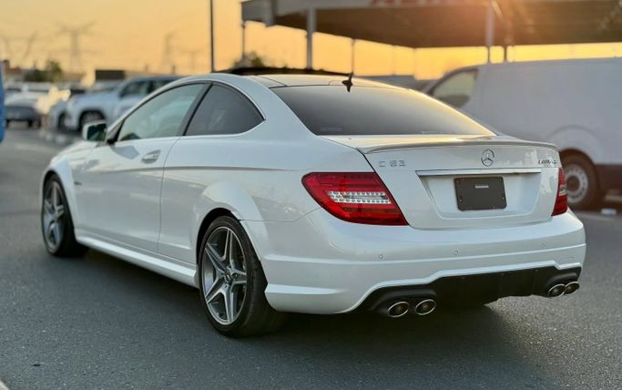 Used Mercedes-Benz C-Class AMG 63 AMG III (W204) Facelift, 6.2 l, 2013 in Dubai by Saeed Auto, White color. Japanese Specs | AUTO.AE