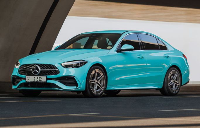 Mercedes-Benz C-Class V (W206), 2022 standard sedan for rent in Dubai by AVA car rental, light blue color | AUTO.AE