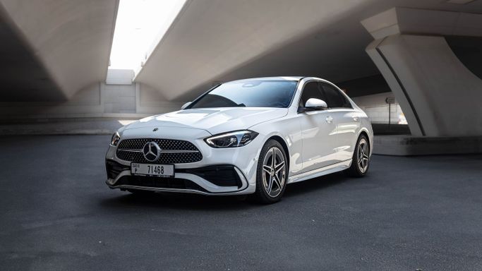 Mercedes-Benz C-Class V (W206), 2022 standard sedan for rent in Dubai by AVA car rental, white color | AUTO.AE
