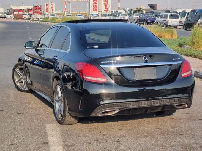 Подержанный Mercedes-Benz C-Class 200 IV (W205), 2.0 л, 2016 в Дубае от Saeed Auto Черный цвет. Японская | AUTO.AE