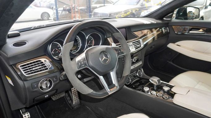 Подержанный Mercedes-Benz CLS AMG 63 AMG II (W218), 5.5 л, 2012 в Дубае от Ibitisam Motors Черный цвет.  | AUTO.AE