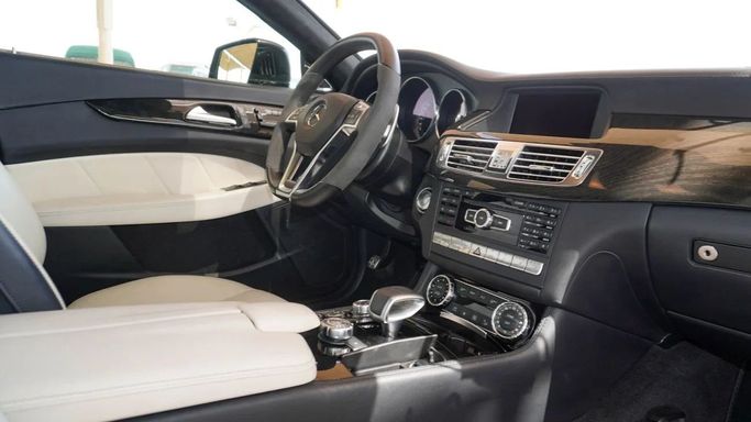 Подержанный Mercedes-Benz CLS AMG 63 AMG II (W218), 5.5 л, 2012 в Дубае от Ibitisam Motors Черный цвет.  | AUTO.AE
