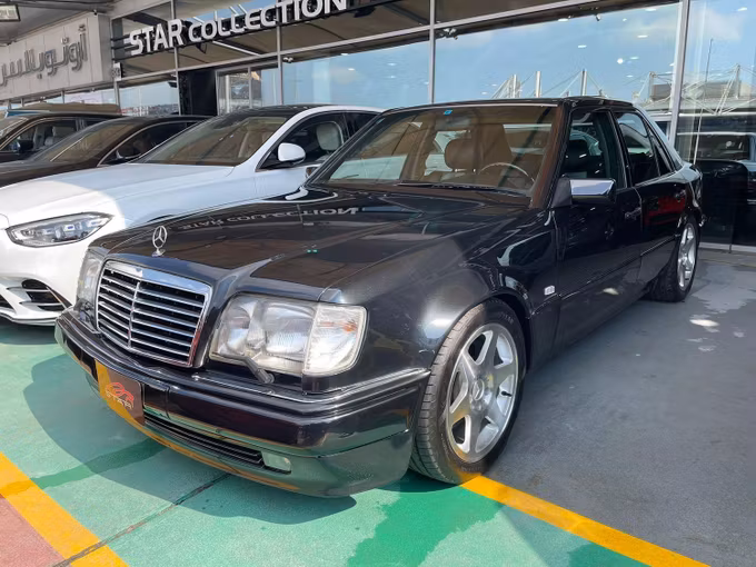 Used Mercedes-Benz E-Class I (W124), 5.0 l, 1995 in Dubai by STAR COLLECTION LLC, Black color. Japanese Specs | AUTO.AE