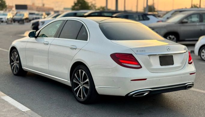 Used Mercedes-Benz E-Class 450 V (W213, S213, C238), 3.0 l, 2019 in Dubai by Saeed Auto, White color. Japanese Specs | AUTO.AE