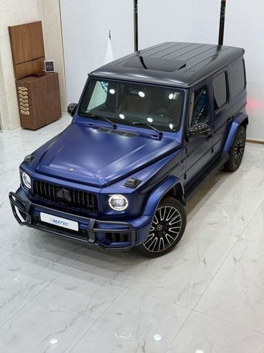 New Mercedes-Benz G-Class AMG 63 AMG II (W465) Facelift, 4.0 l, 2025 in Dubai by 4 Matic Motors, Navy Blue color. GCC Specs | AUTO.AE