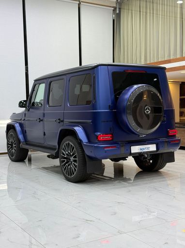 Новый Mercedes-Benz G-Class AMG 63 AMG II (W465) Рестайлинг, 4.0 л, 2025 в Дубае от 4 Matic Motors Тёмно-синий цвет. GCC | AUTO.AE