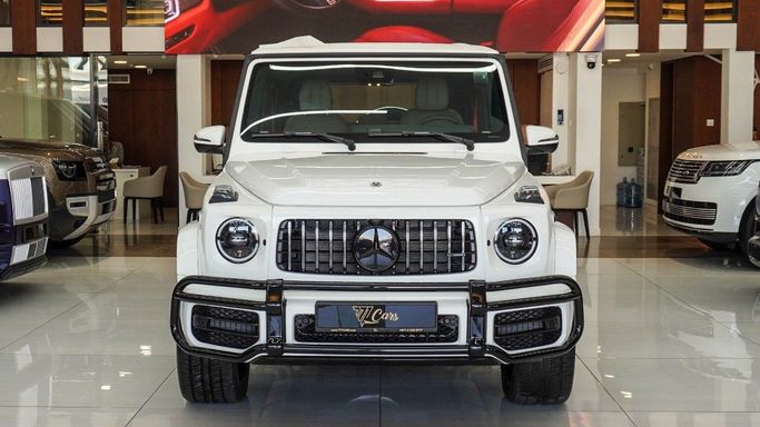 Новый Mercedes-Benz G-Class AMG 63 AMG II (W465) Рестайлинг, 4.0 л, 2024 в Дубае от 777 CARS Белый цвет. Европейская | AUTO.AE