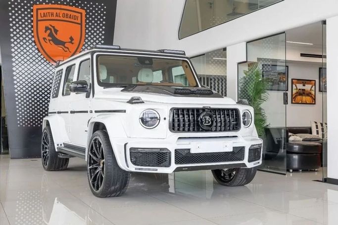 New Mercedes-Benz G-Class AMG 63 AMG II (W465) Facelift, 4.0 l, 2024 in Dubai by Laith Alobaidi Motors, White color. Korean Specs | AUTO.AE