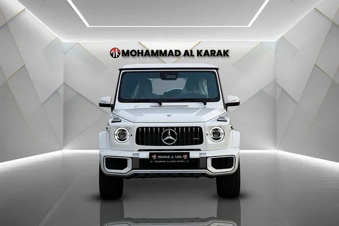 New Mercedes-Benz G-Class AMG 63 AMG II (W465) Facelift, 4.0 l, 2025 in Dubai by Mohammad Alkarak Motors, White color. Korean Specs | AUTO.AE
